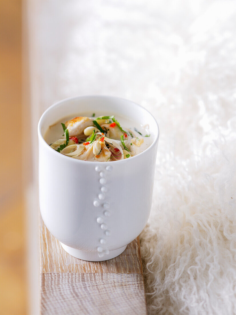 Thai chicken soup in a cup