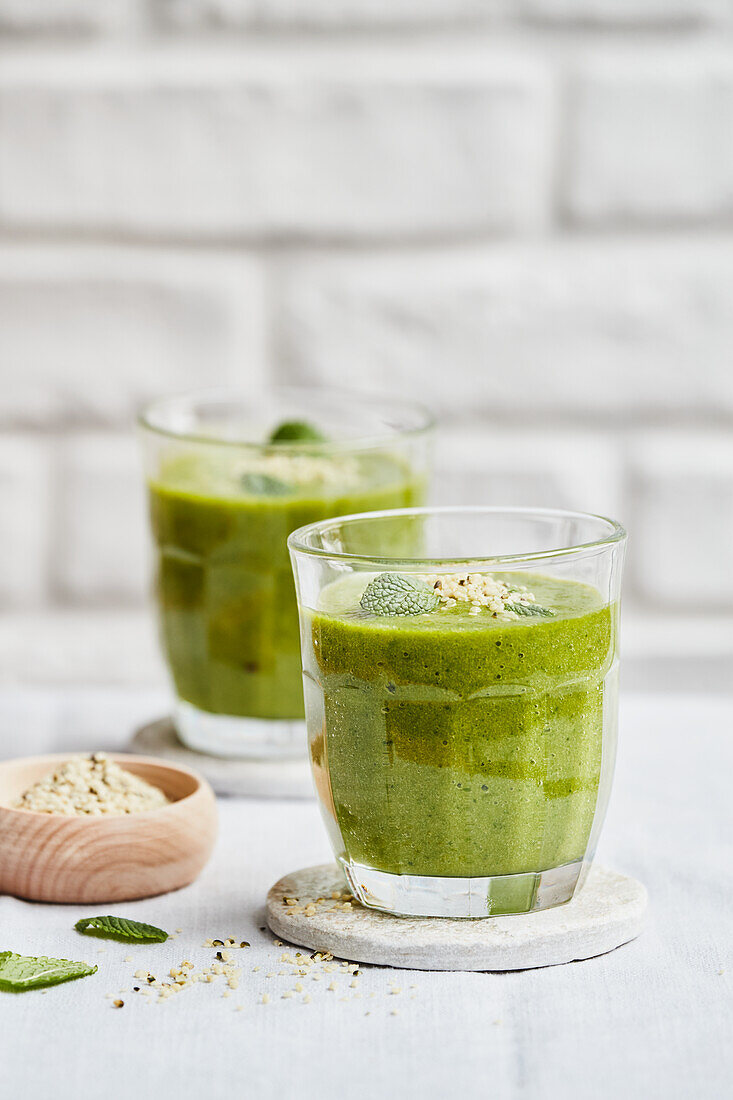 Green pineapple-avocado smoothie with spirulina and vanilla