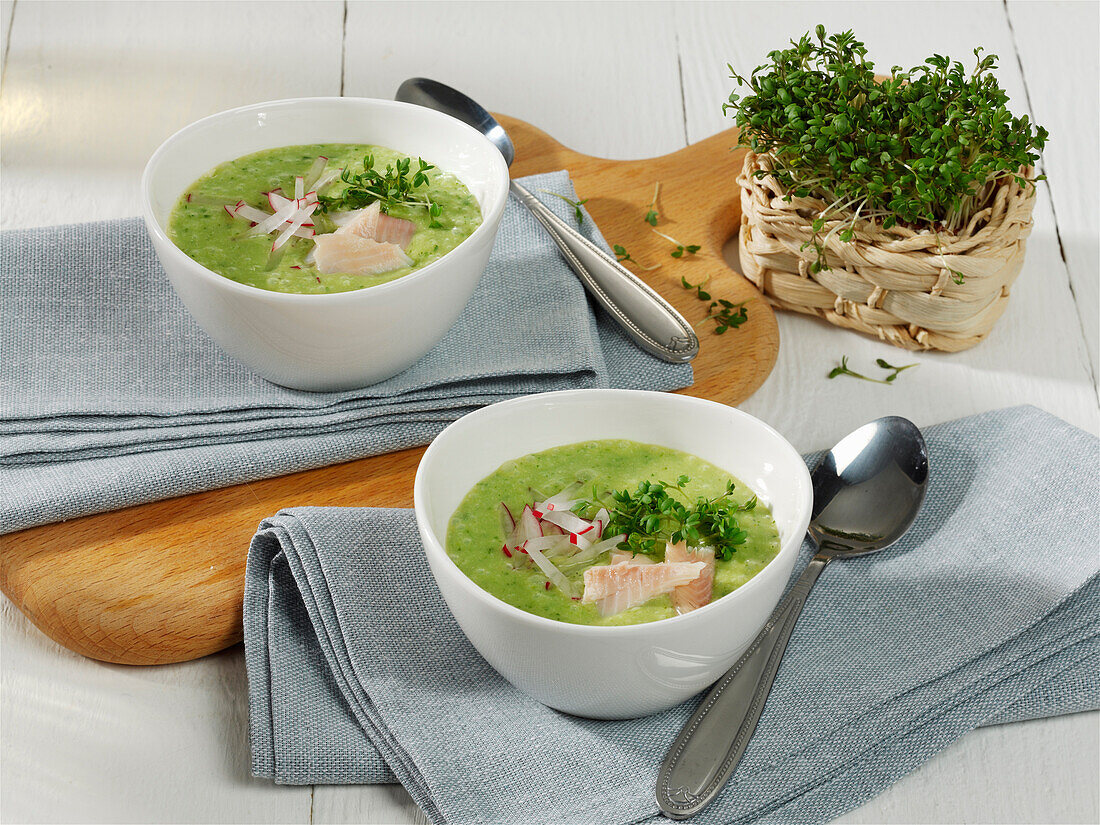 Green herb soup with radish and smoked trout