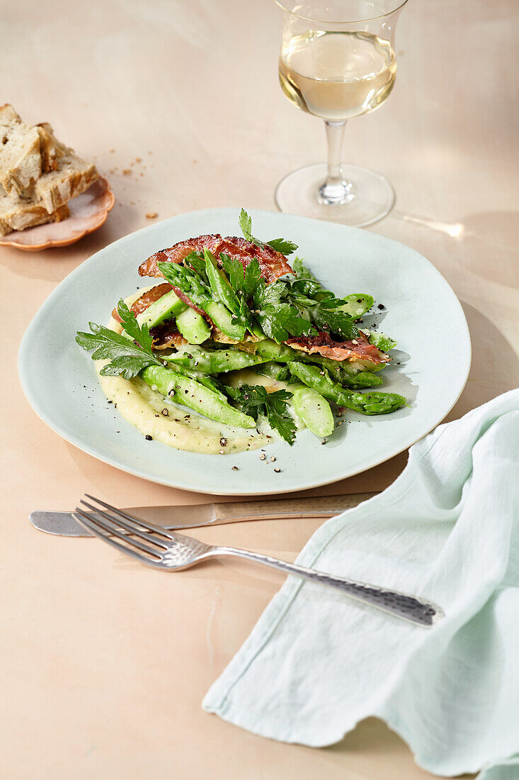 Asparagus salad with crispy bacon and potato-parsley dressing