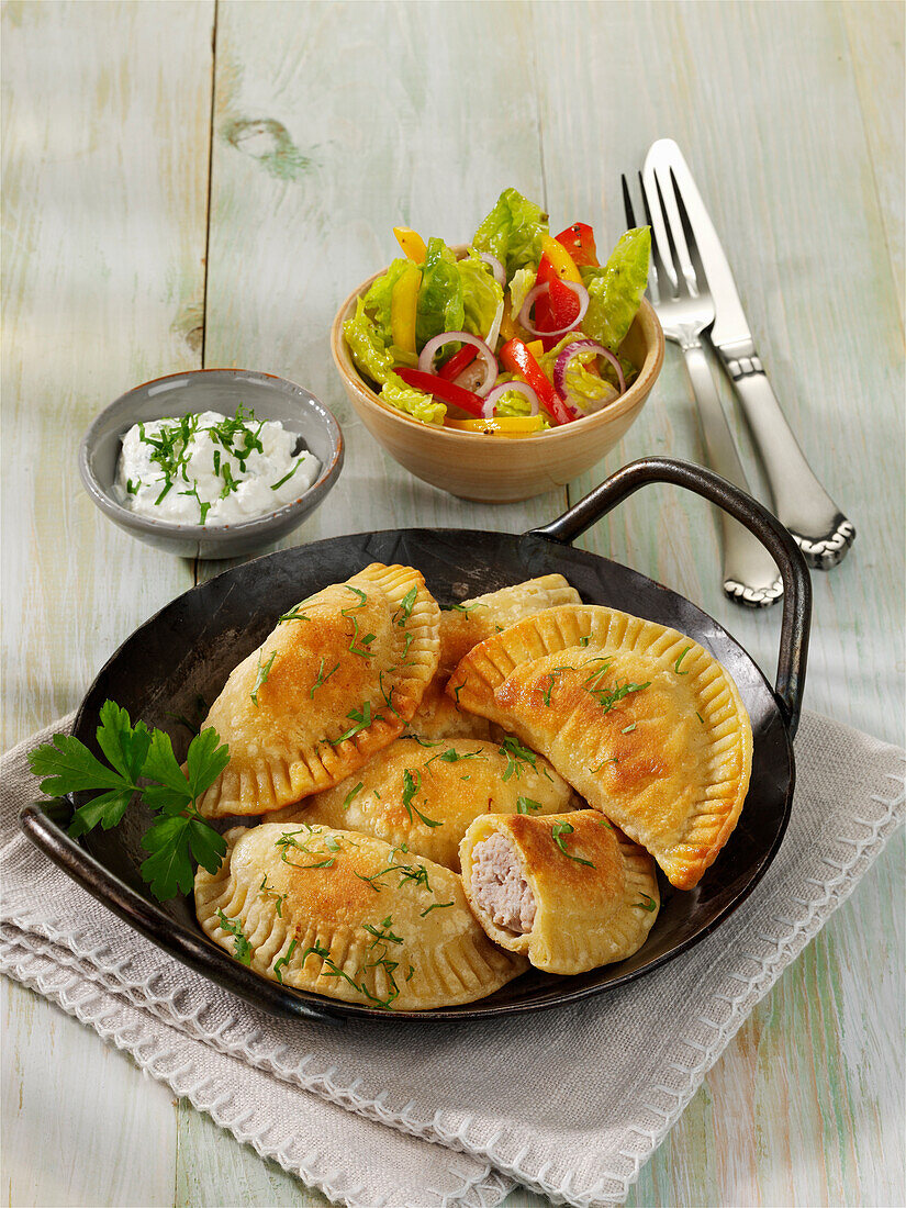 Fried ravioli with sausage filling