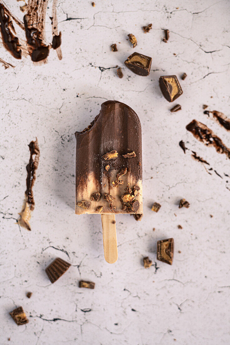 Peanut butter chocolate ice cream on a stick