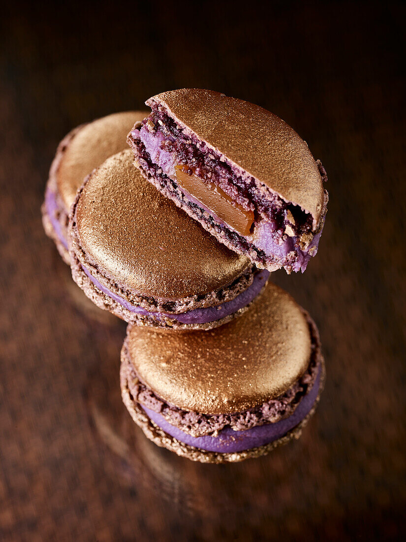 Chocolate macarons with purple cream