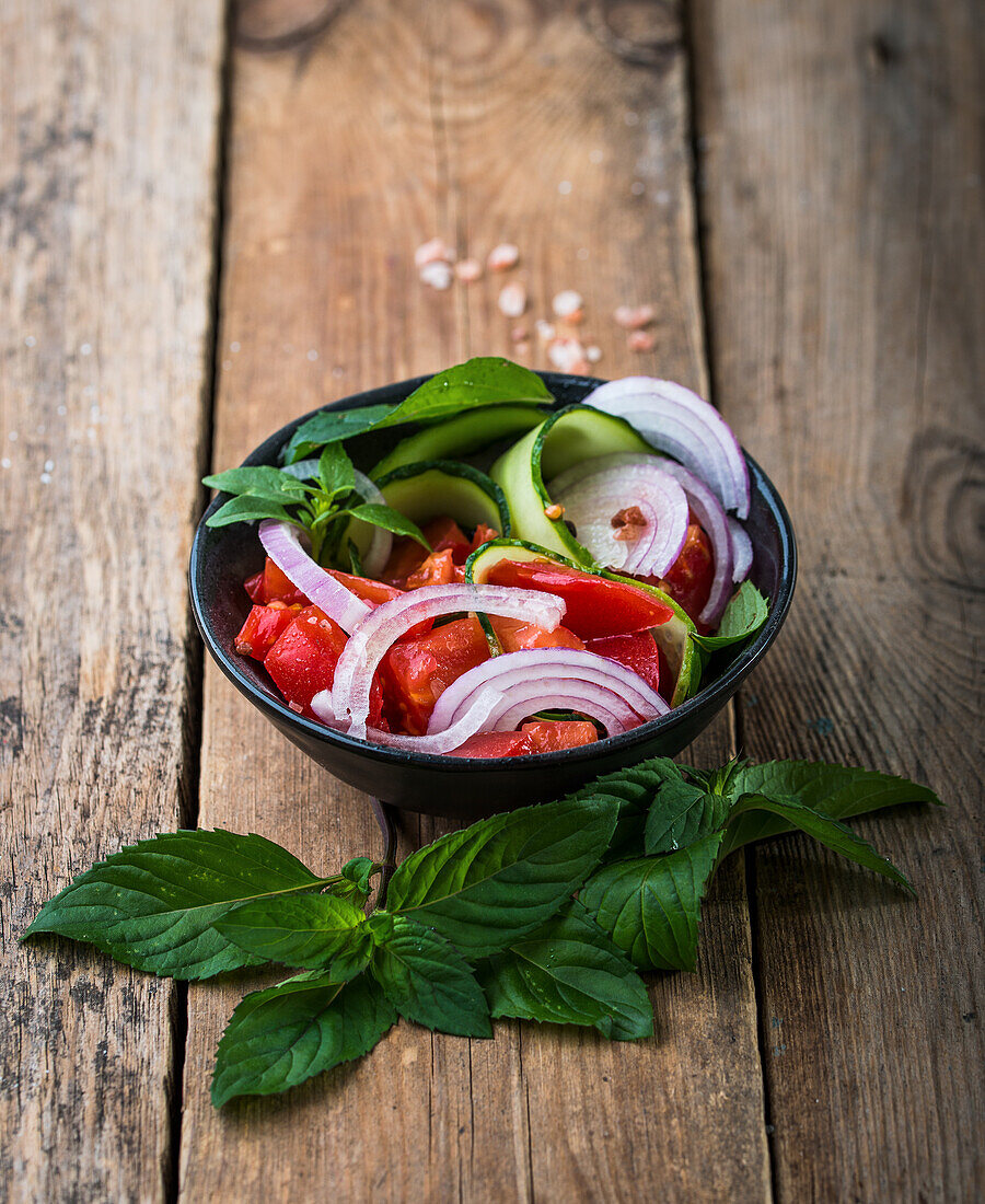 Tomato and cucumber salad with red onions