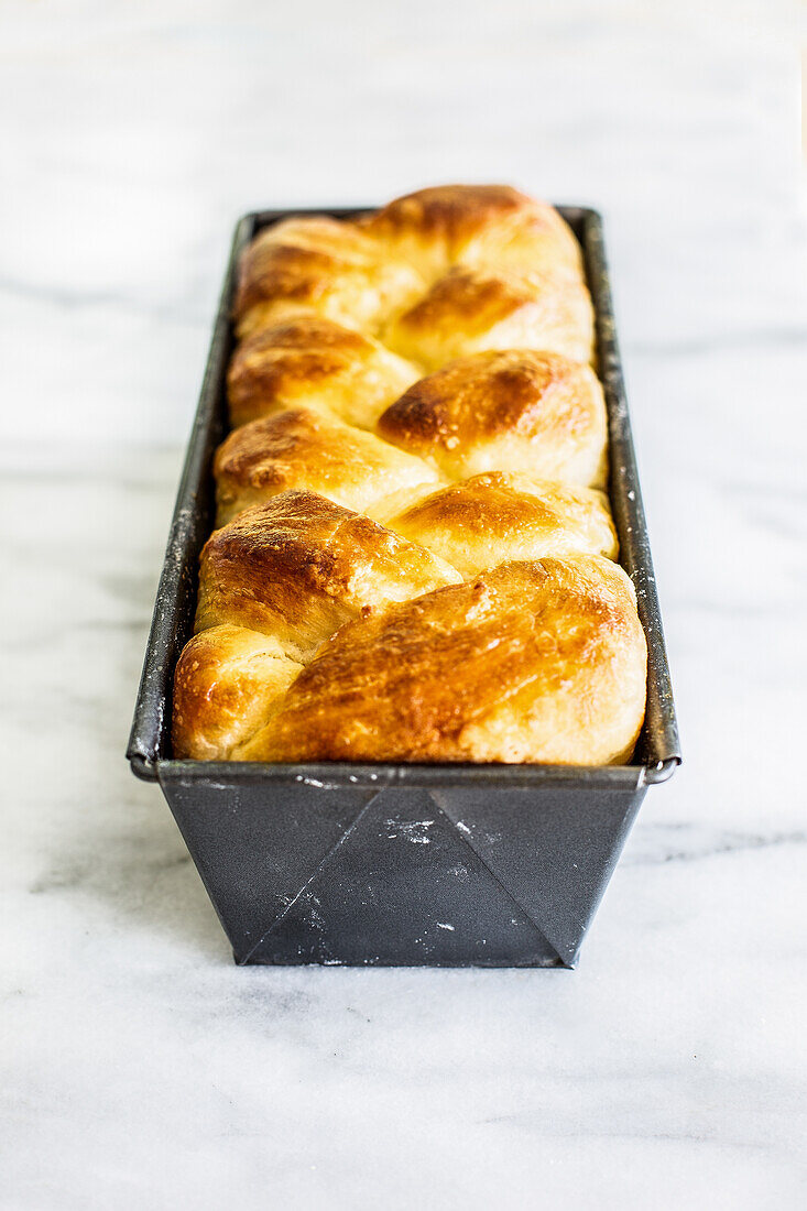 Yeast plait in a loaf tin