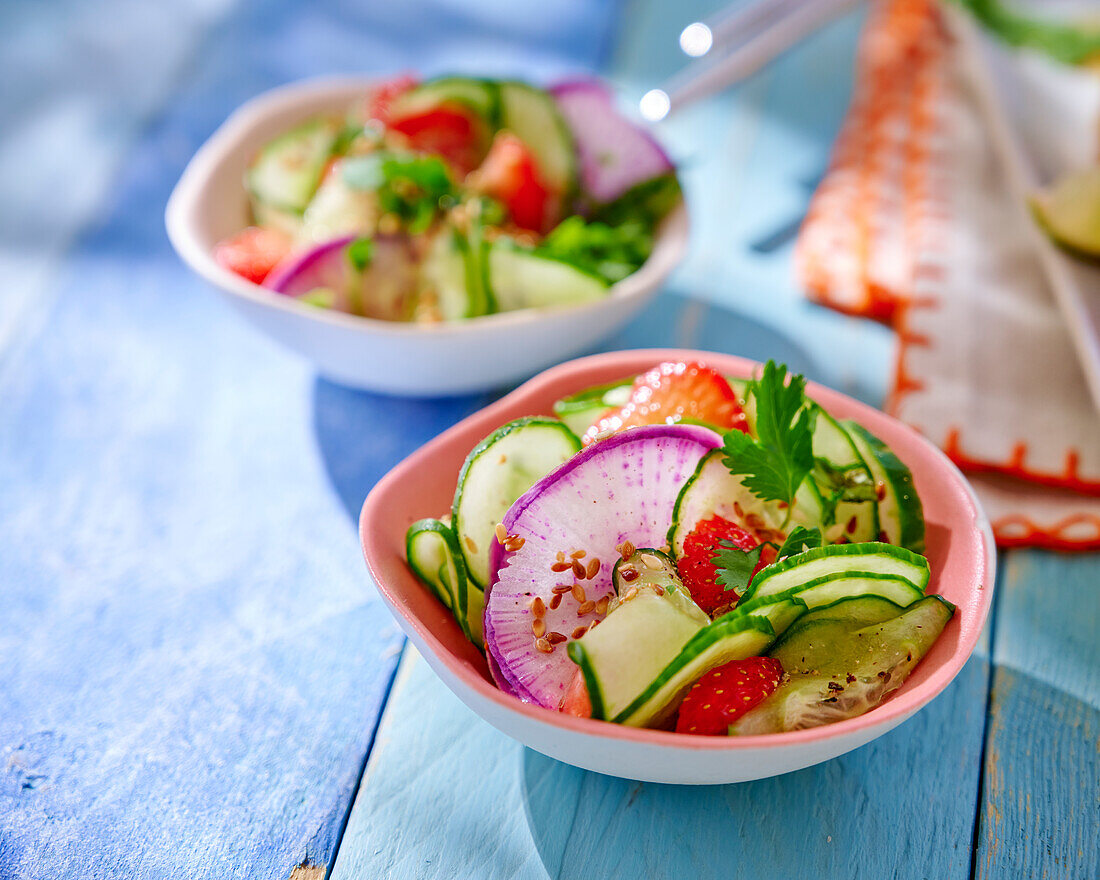 Cucumber salad with radish and strawberries