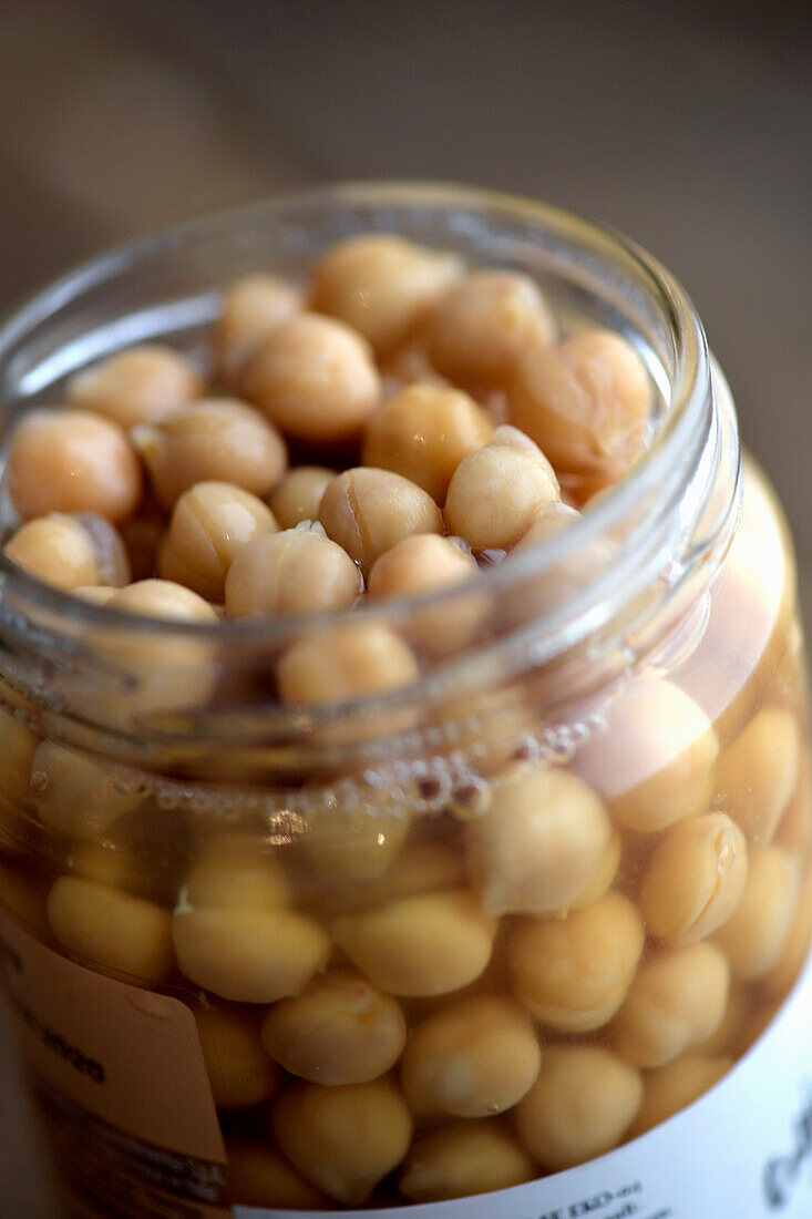 Jar of cooked chickpeas (close-up)