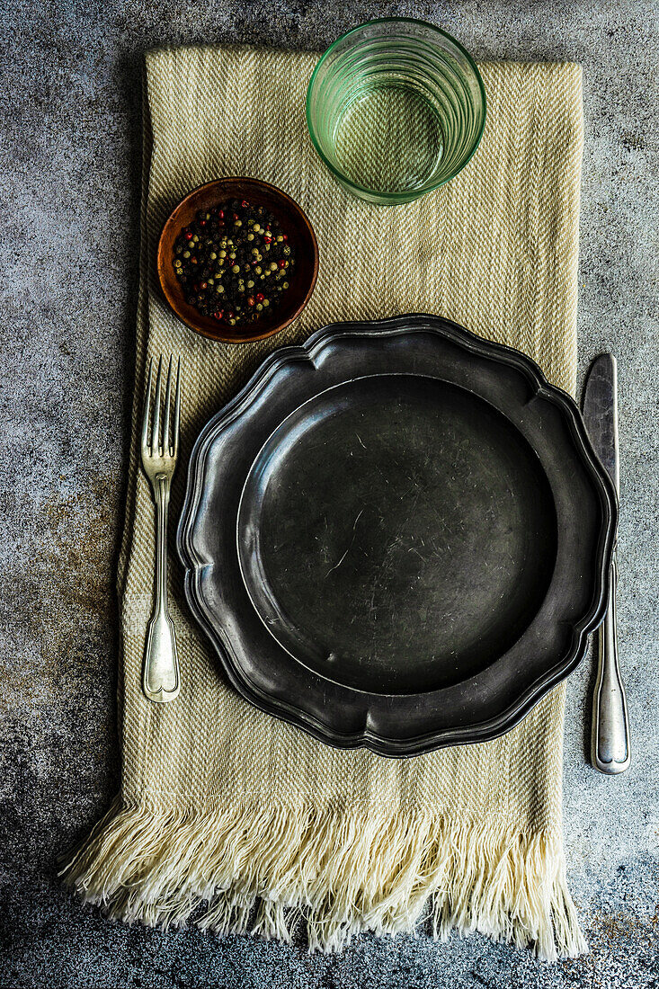 Vintage tableware on the rustic towel