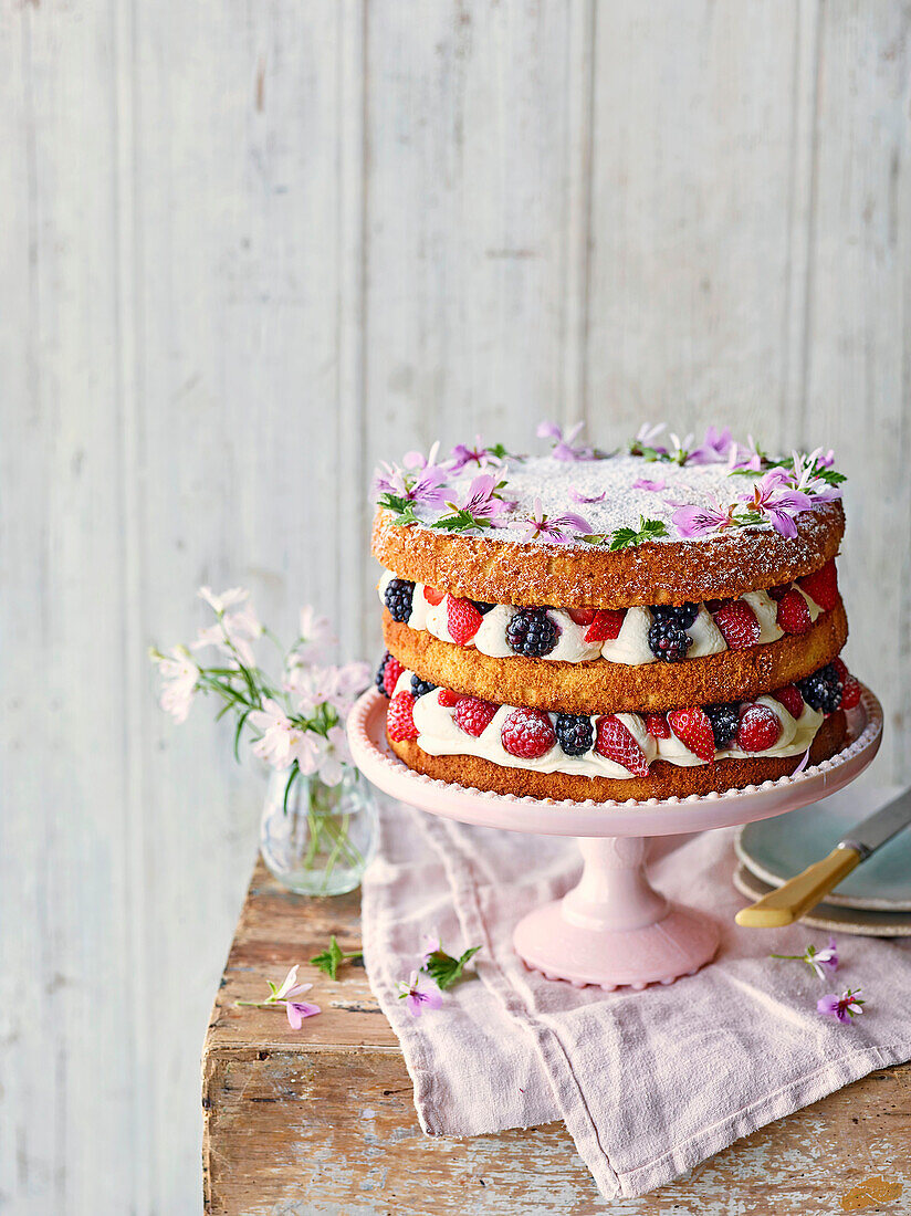 Summer berry cake with rose geranium cream