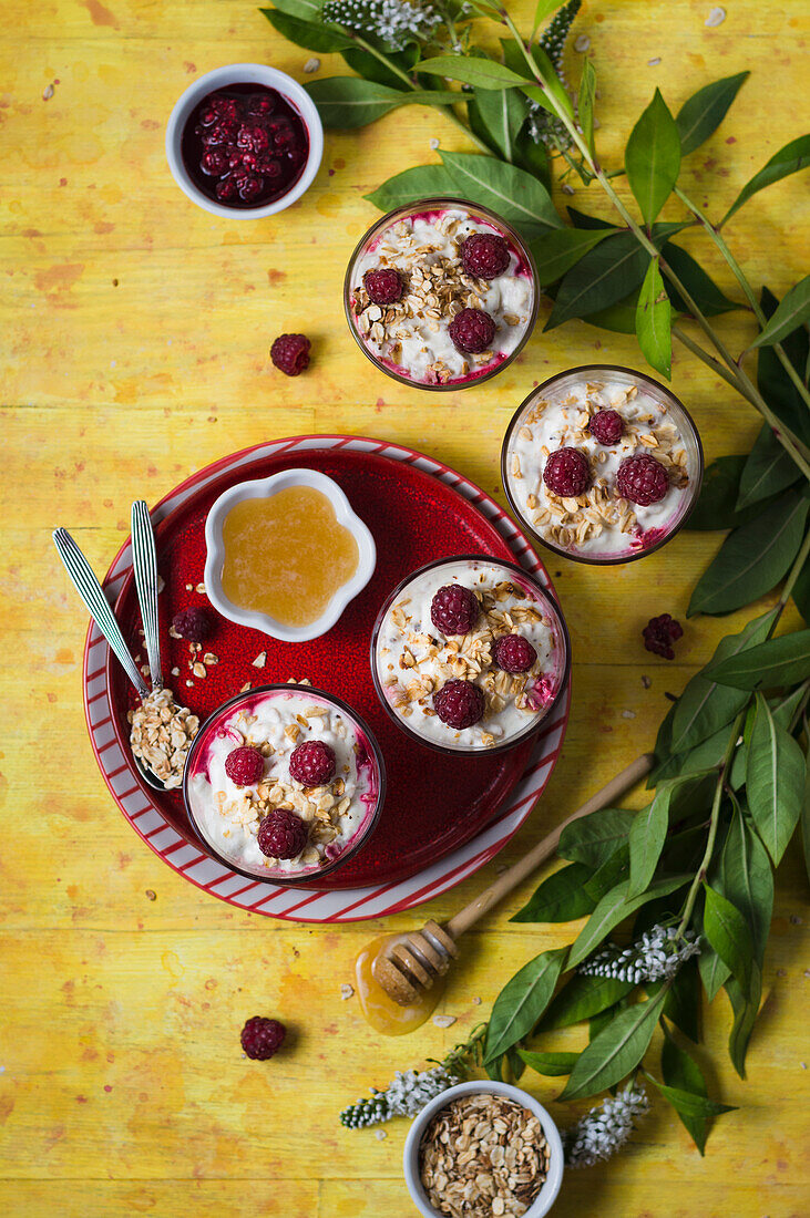 Fresh raspberries with whipped cream, honey, and toasted oats (cranachan)