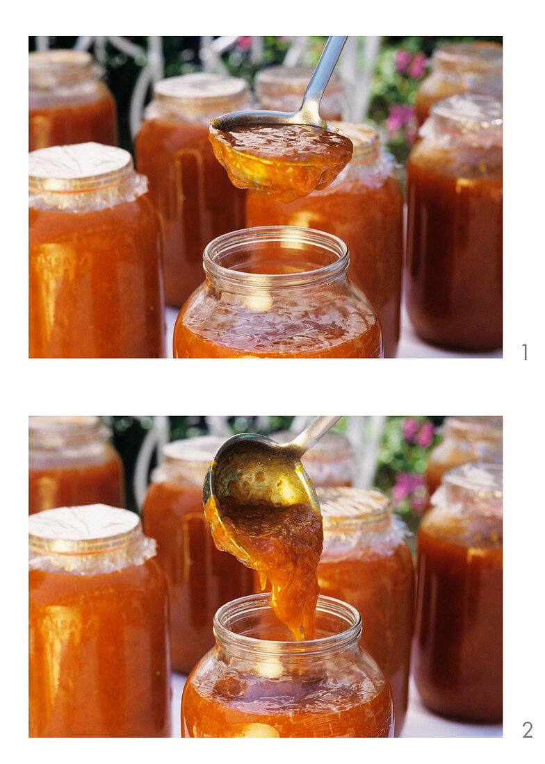 Ladling apricot jam into jars