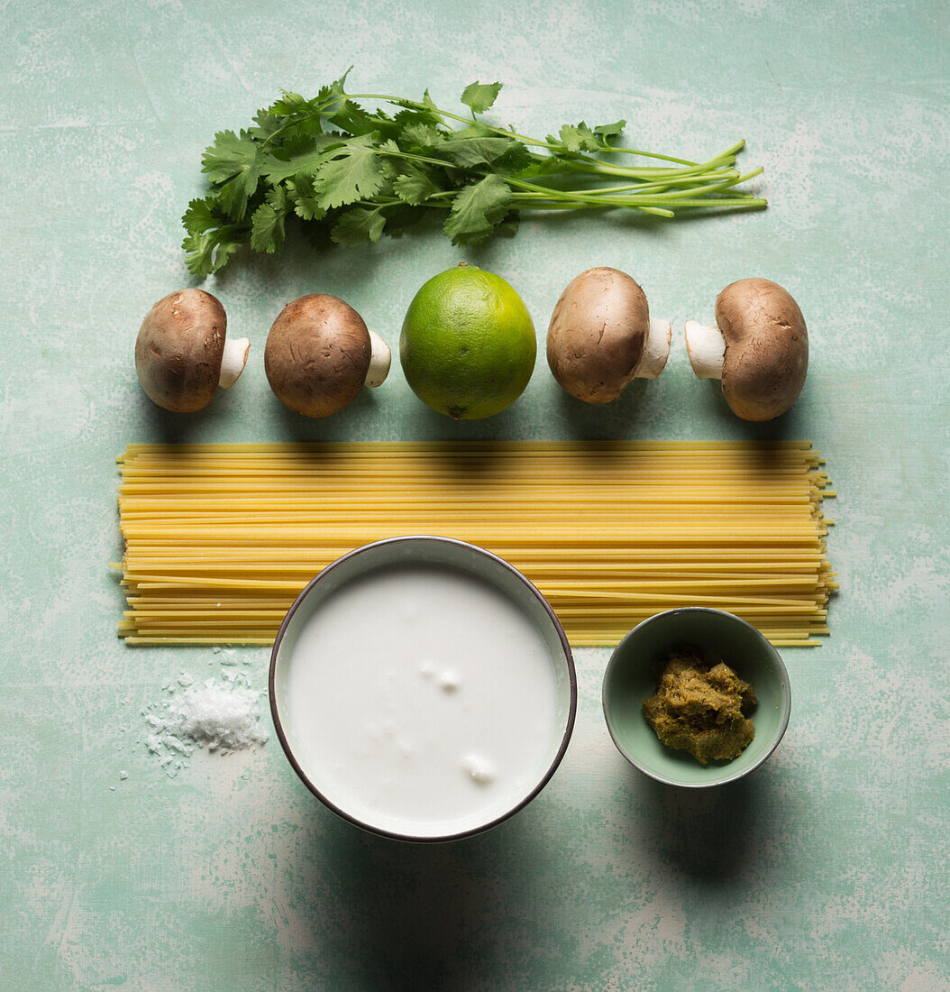 Ingredients for vegan pasta with cilantro and curry paste