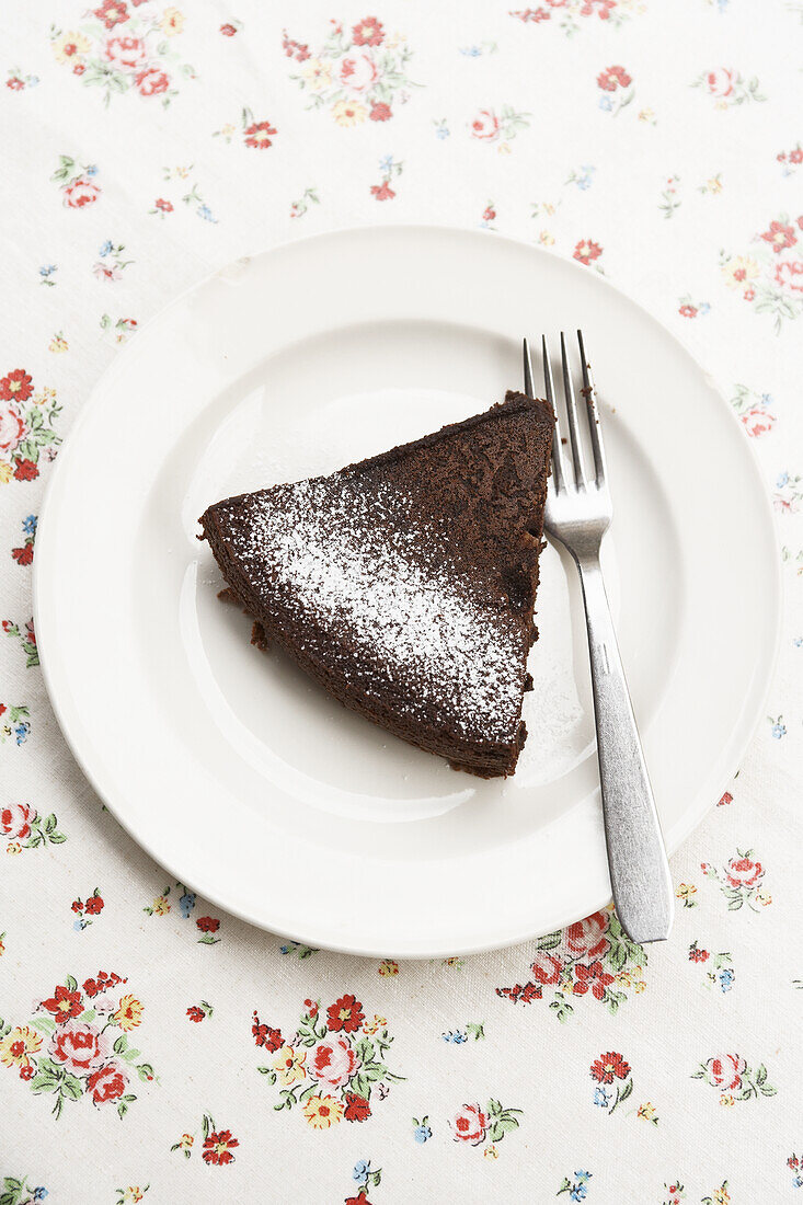 A piece of Gateaux au Chocolat on a plate