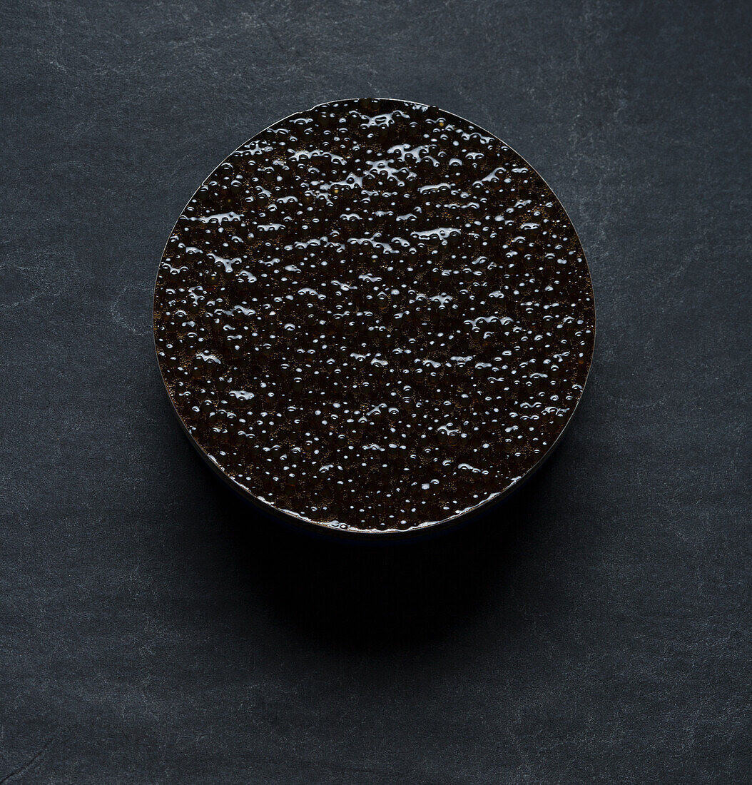 Vegan 'caviar' - tapioca with liquorice syrup and pears