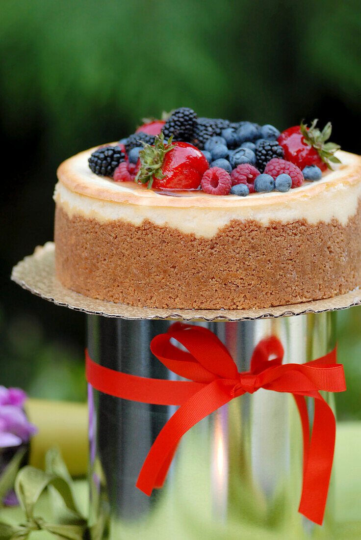 Cake with icing and fresh berries