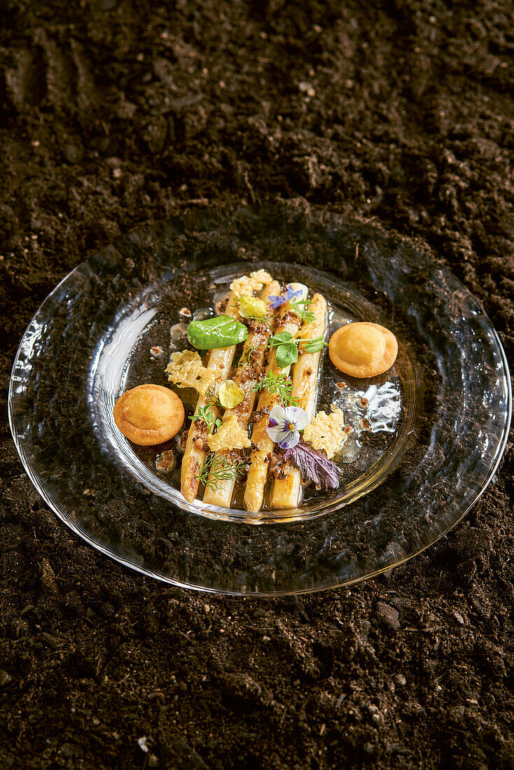 Roasted asparagus with truffle vinaigrette and potato ravioli