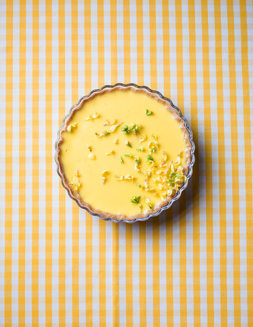 Rhubarb tart with golden nettle blossoms