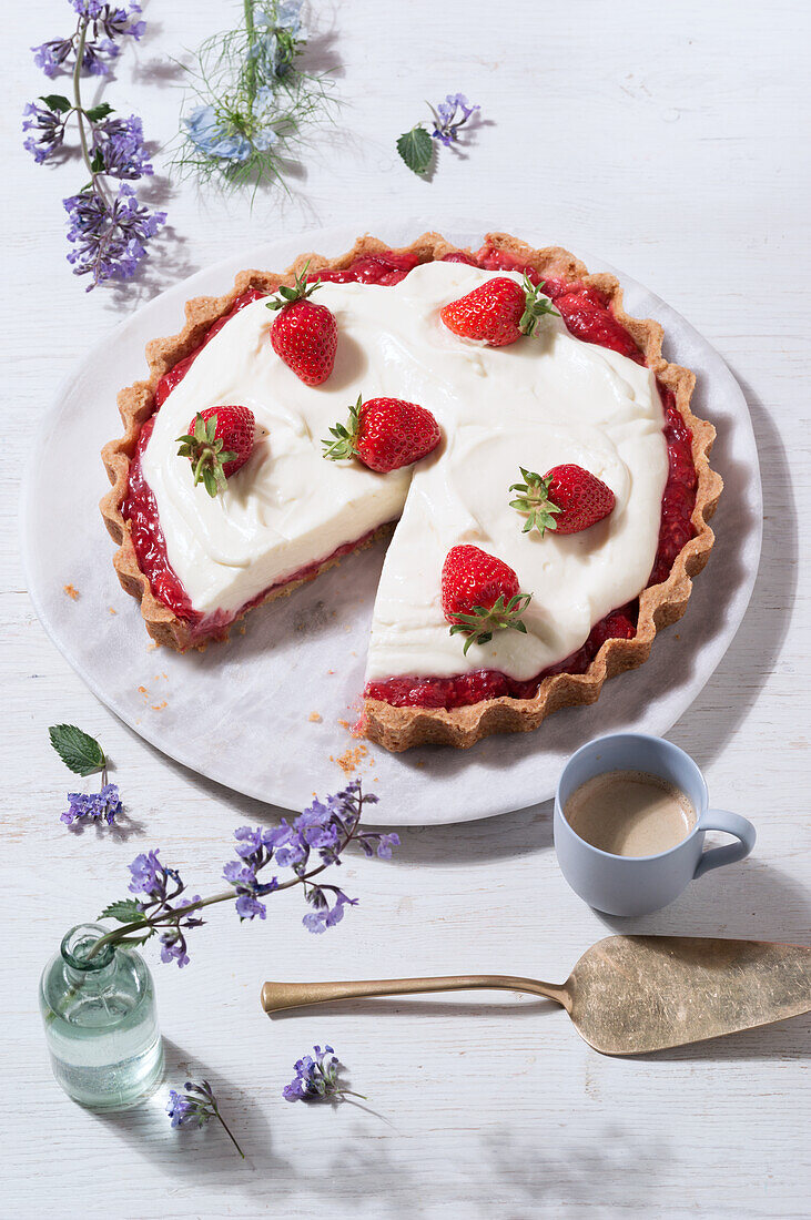 Curd tart with white chocolate cream and strawberries