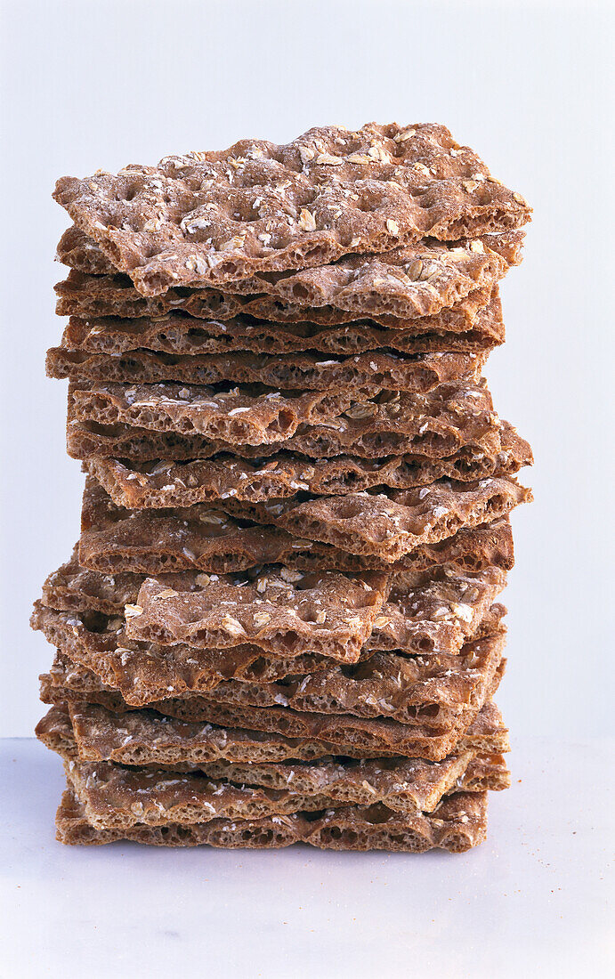 A pile of crispbread on a light background