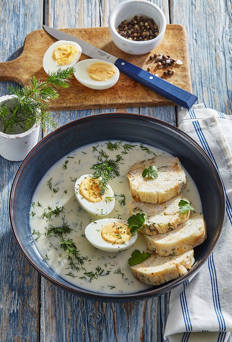 Dill sauce with hard boiled eggs and dumplings