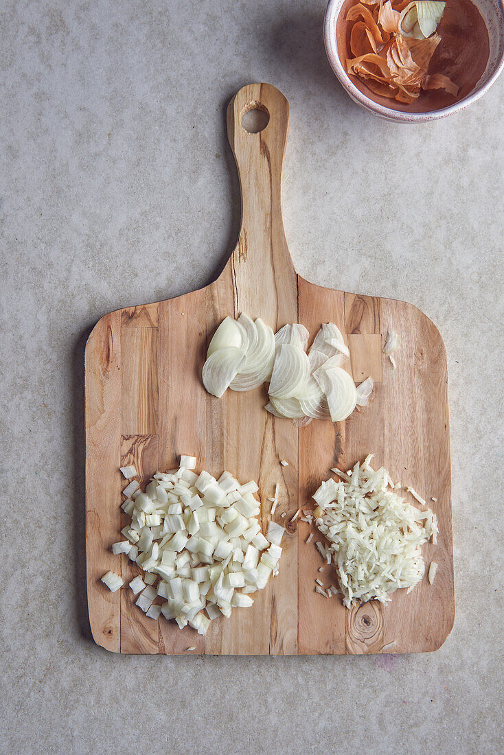 Onion cut into half moon sices, brunoise, and diced