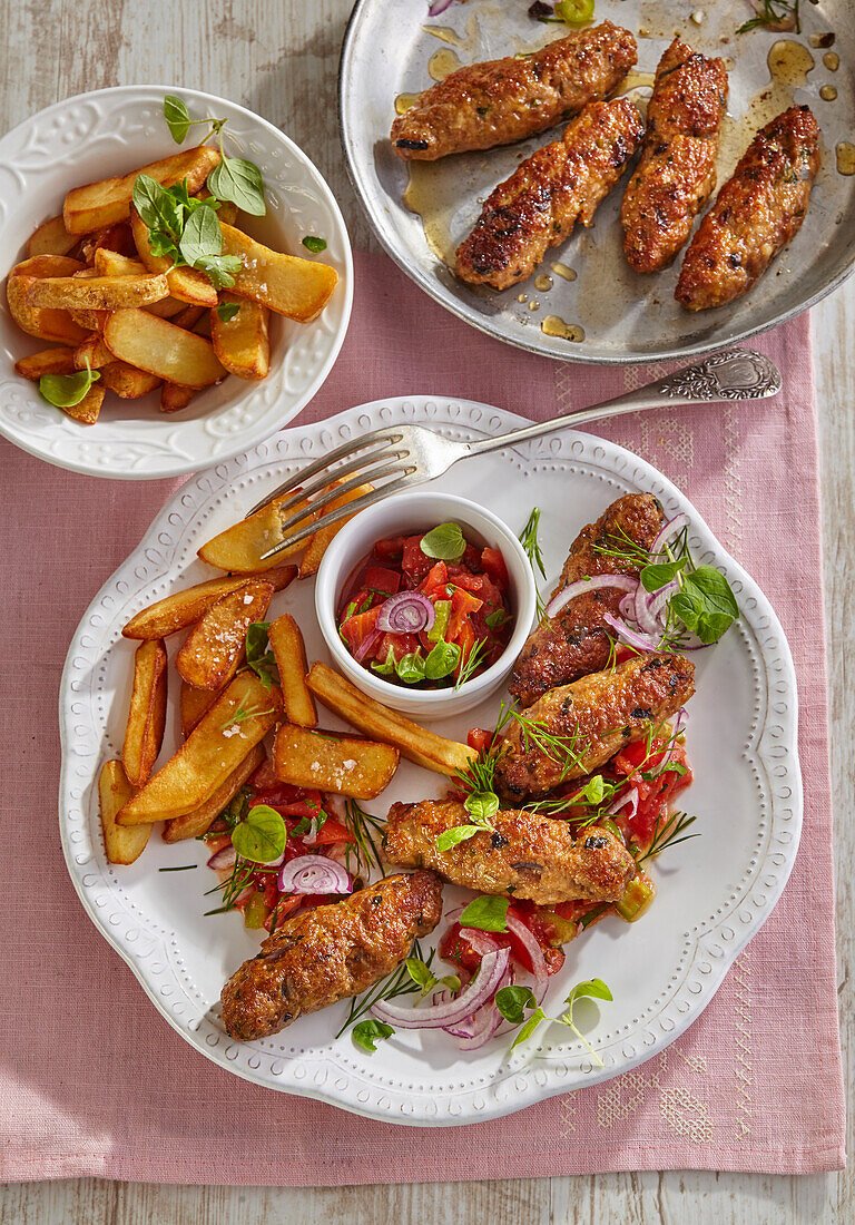 Cevapi with salad (Blakan minced meat sausages)