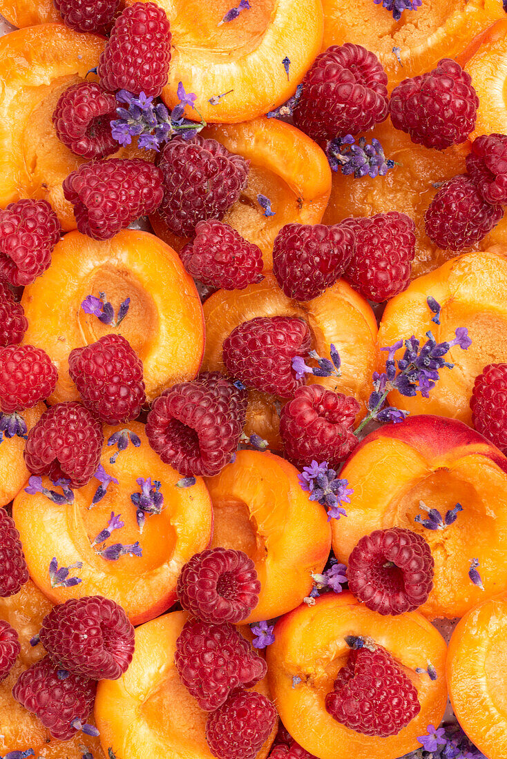 Apricot, raspberries and lavender flowers