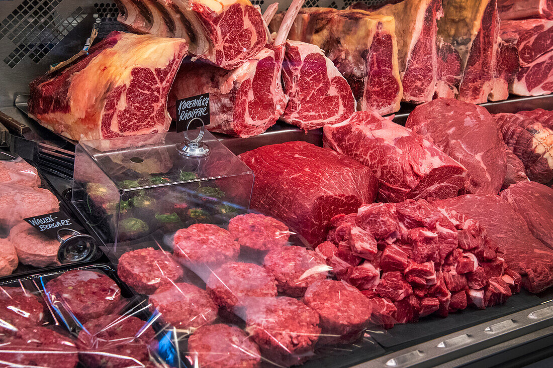 Meat products on display in a market hall (Sweden)