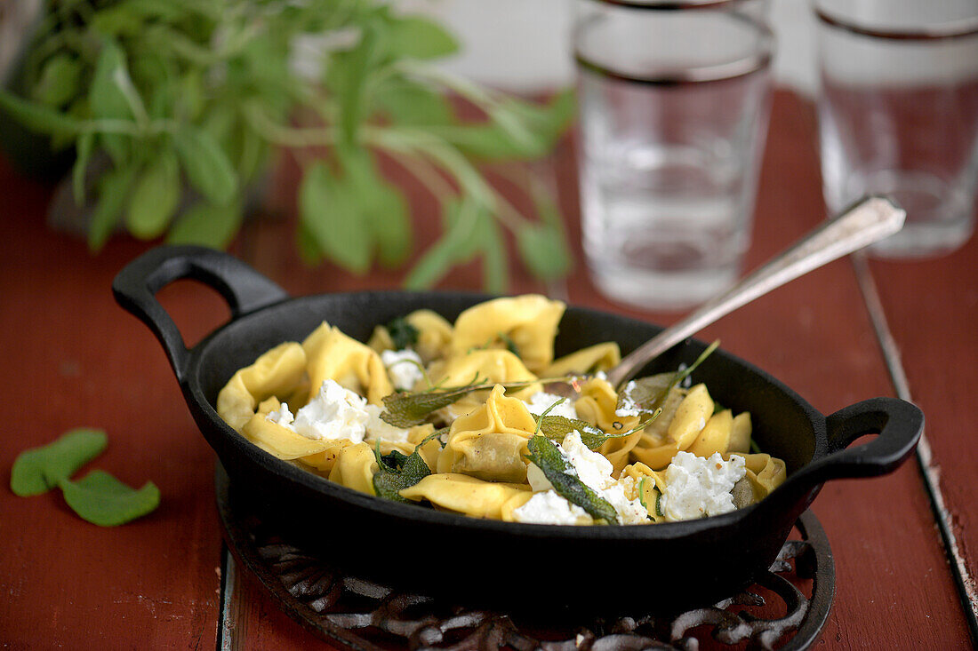 Tortellini with lemon-scented sage butter and goat cheese