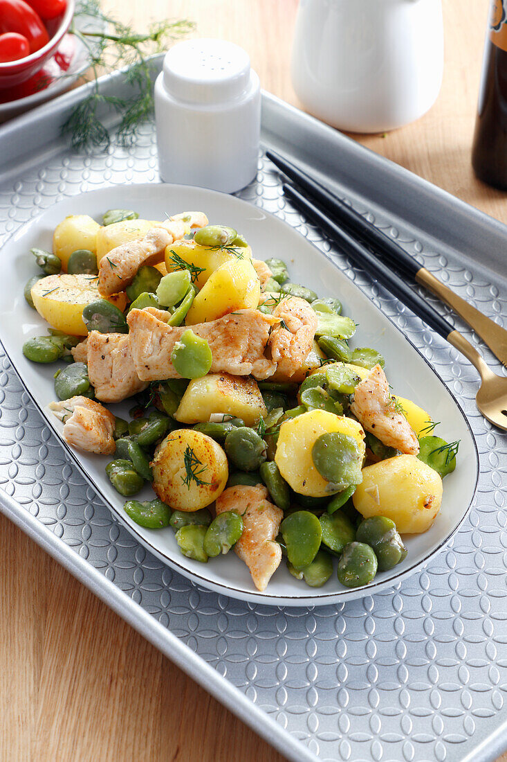 Chicken breast with broad beans and potatoes