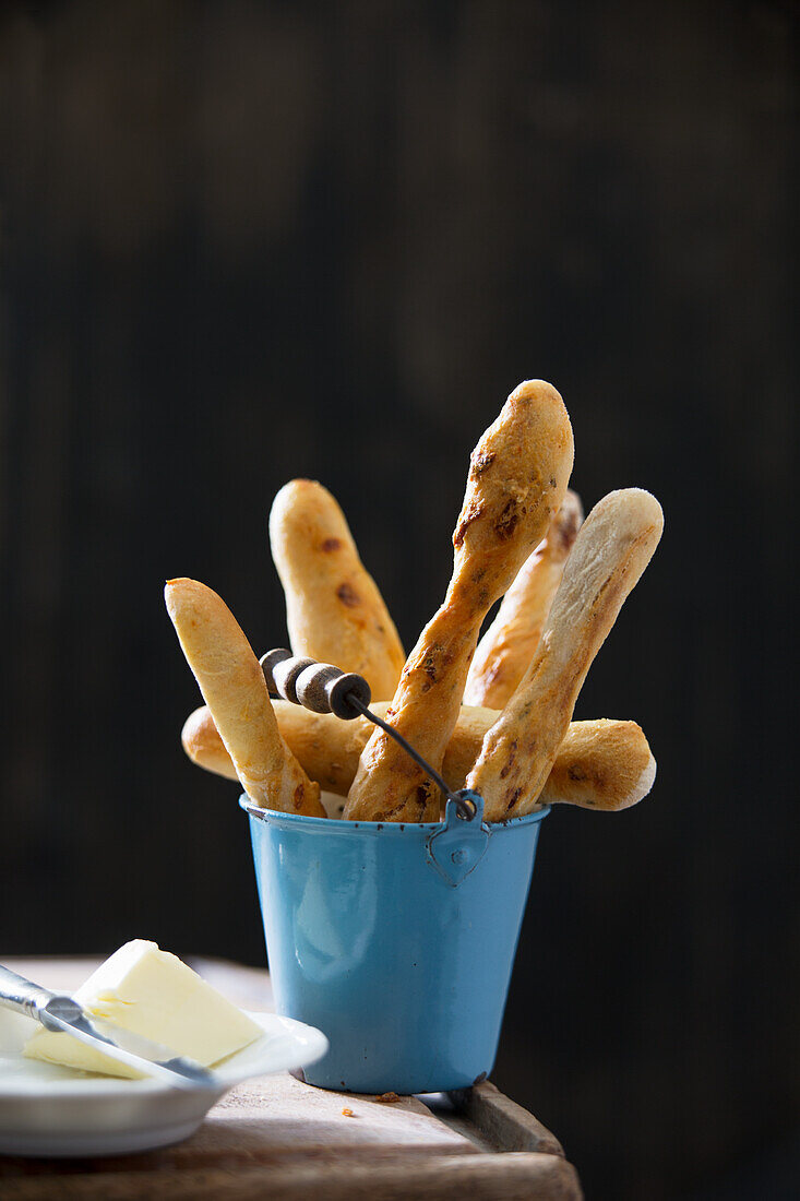 Mini baguettes in a small bucket