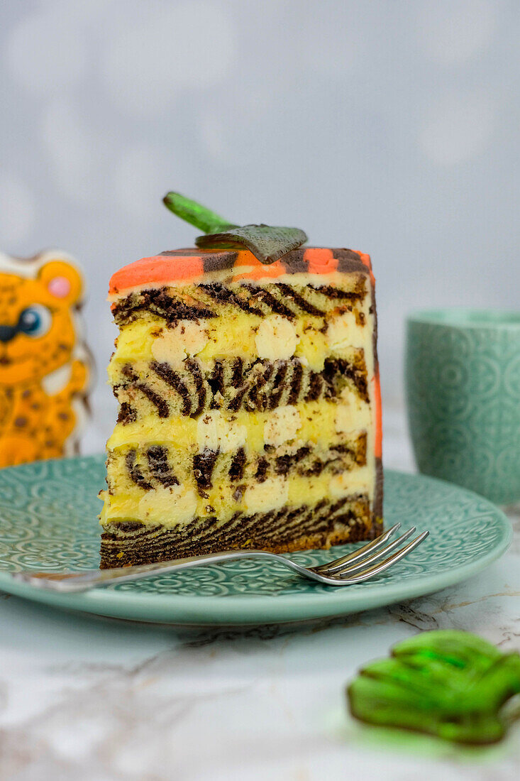 One slice of chocolate-orange zebra cake