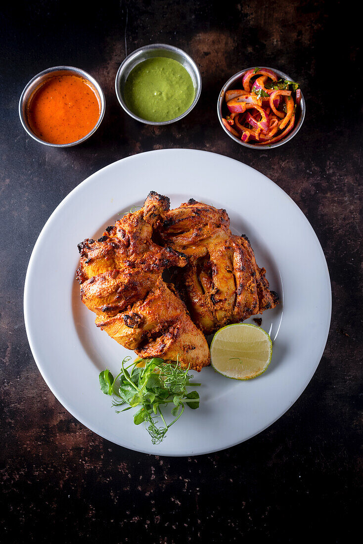 Mariniertes Tandoori-Huhn mit Kaschmir-Chili und Royal Cumin (Indien)