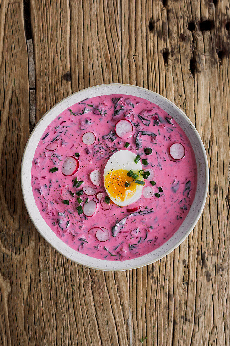 Cold beet soup with egg and radish