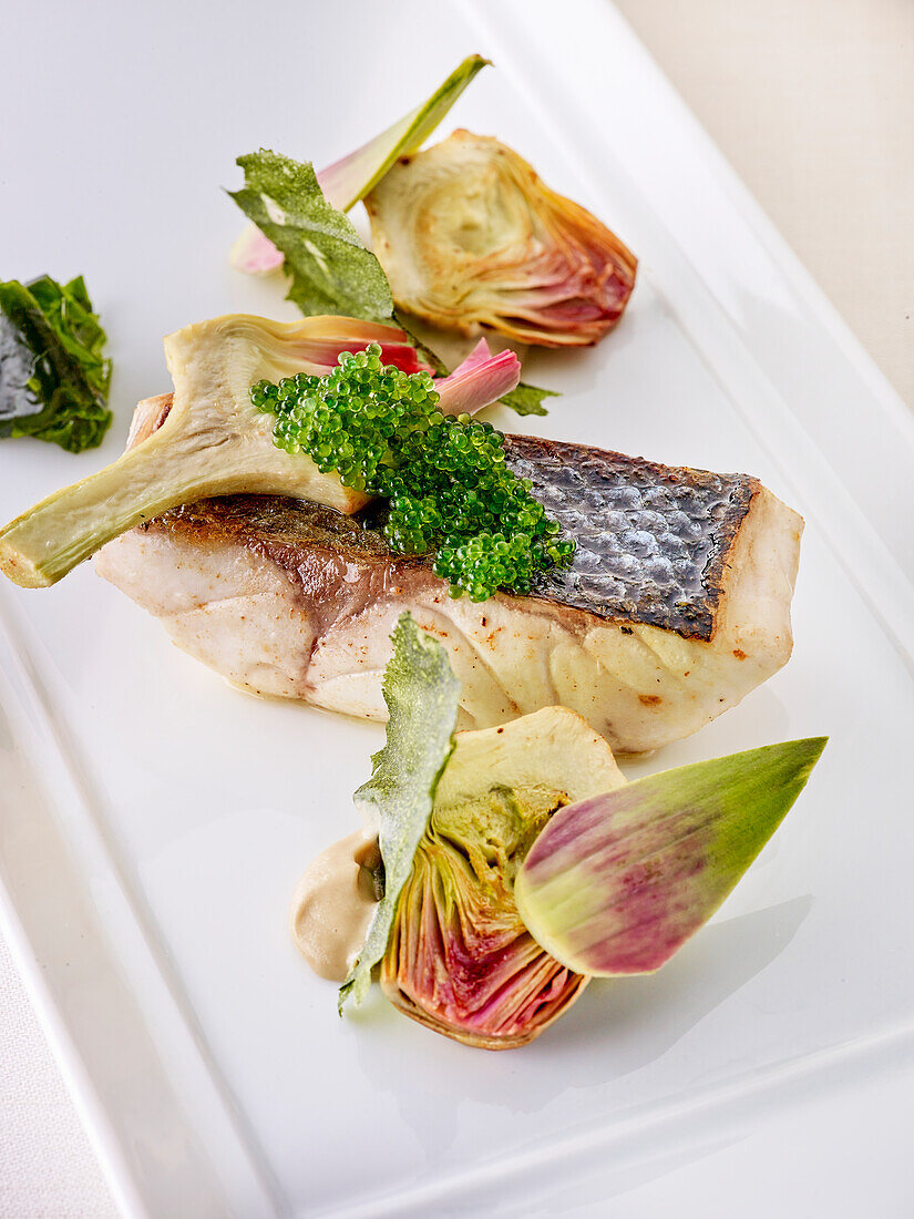 Perch fillet with artichokes