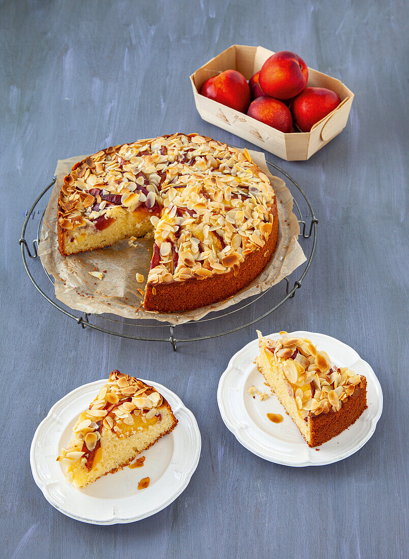 Nectarine cake with almond flakes
