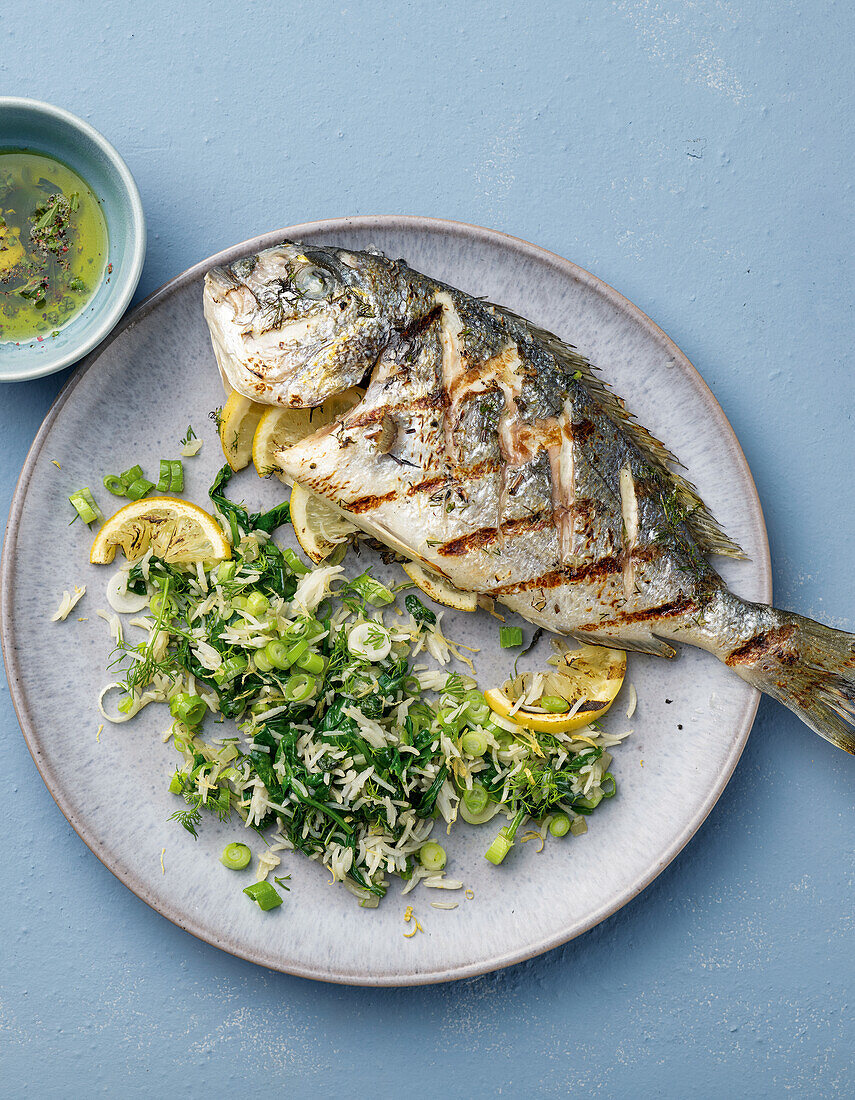 Grilled gilthead with Greek spinach rice