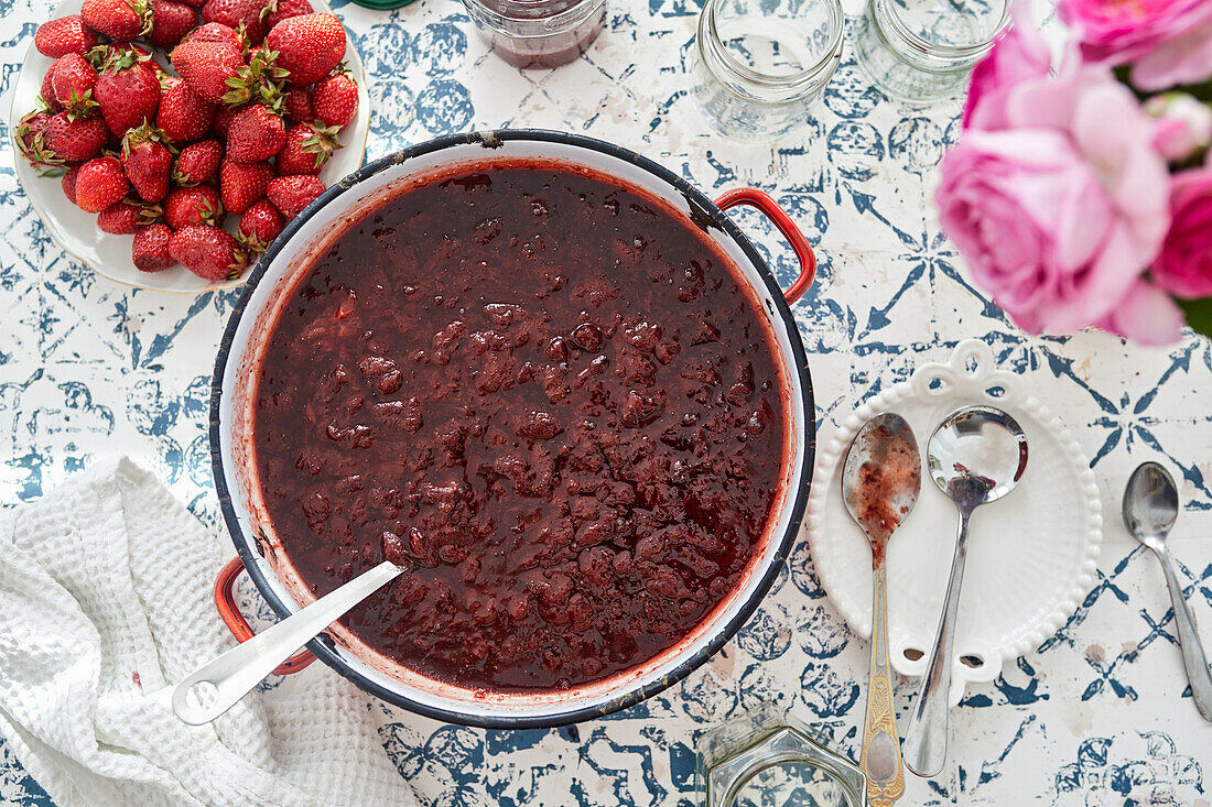 Freshly made strawberry jam in a pot