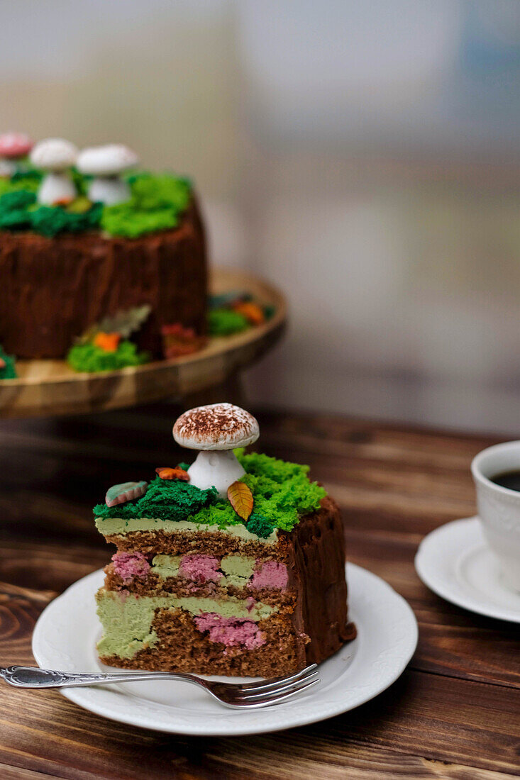 Autumnal pistachio berry cake decorated with meringue mushrooms