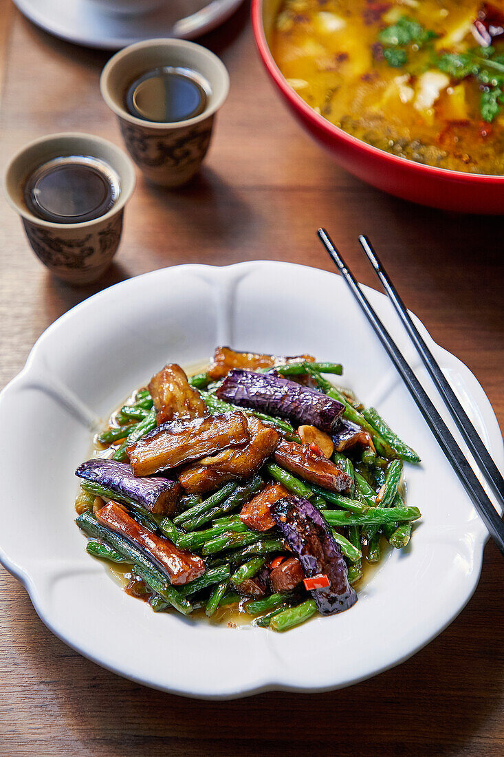 Fried eggplant with green beans (China)