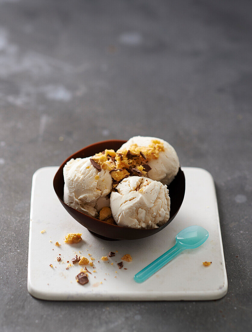 Ice cream dessert in an edible chocolate bowl