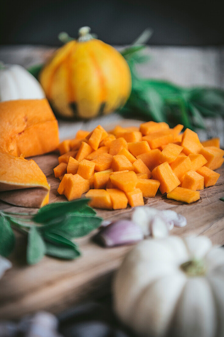 A copped butternut squash on a chopping bard