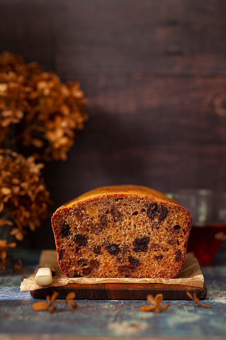 A cut into tea bread loaf with copyspace