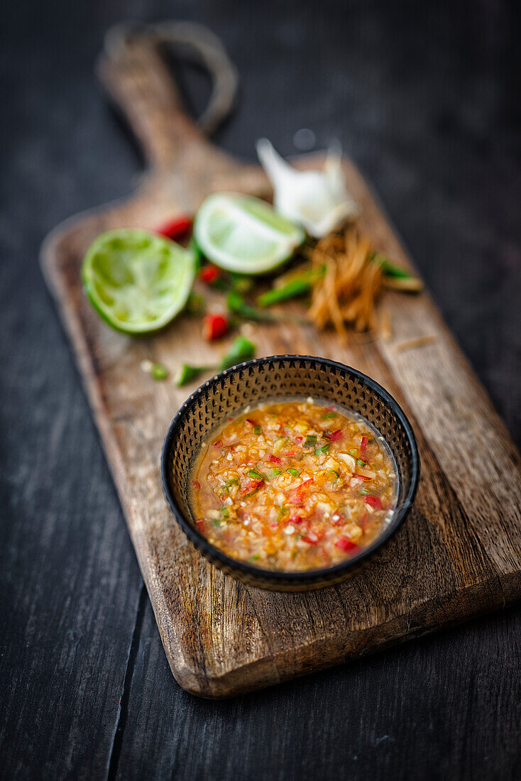 Seafood dip with coriander root, palm sugar, garlic, lime and chili
