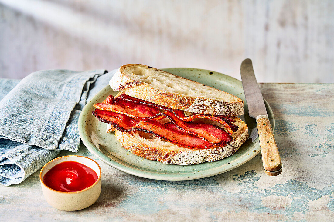 Bread with bacon on a plate