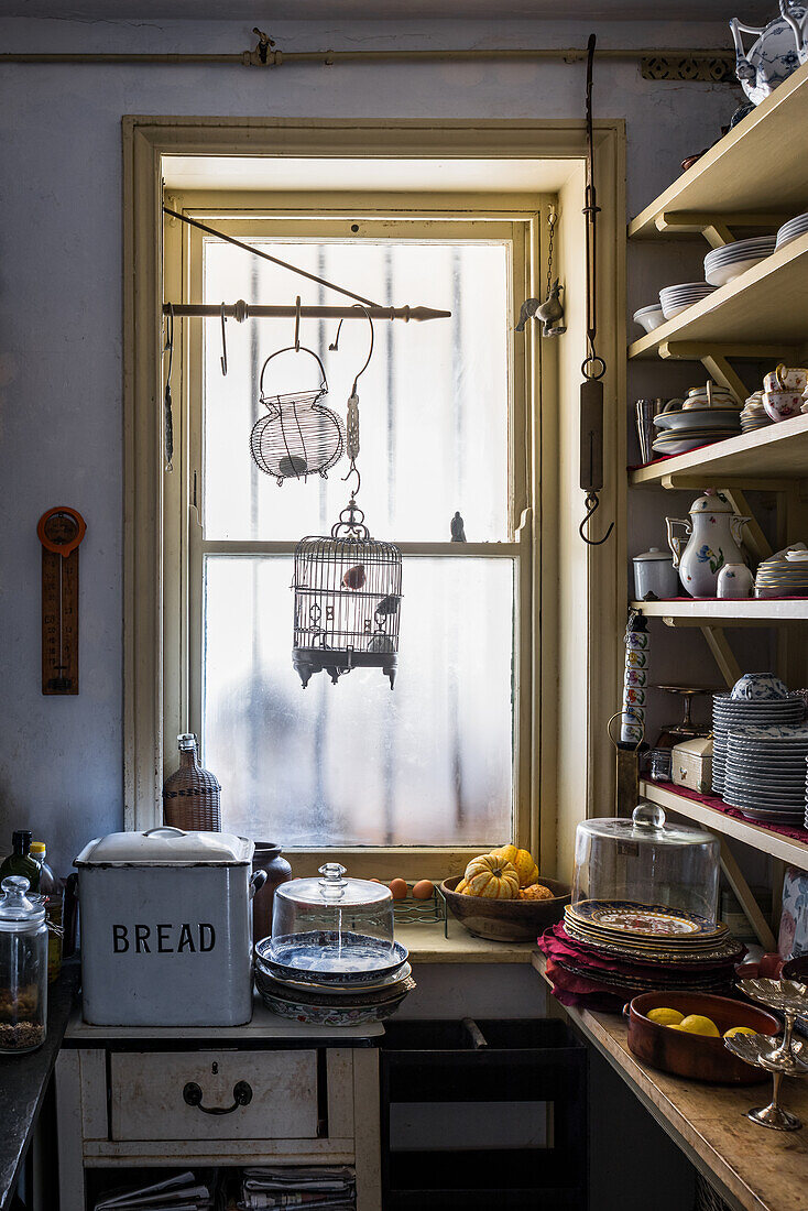 Birdcages at kitchen window