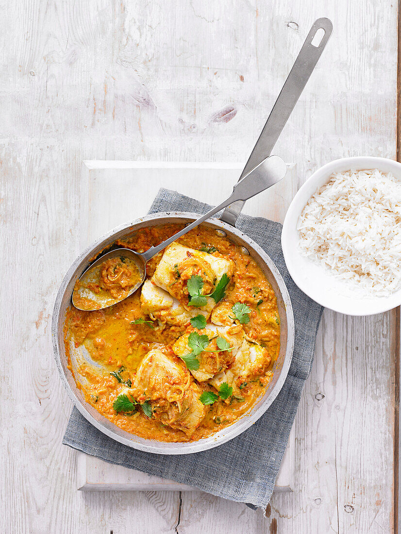 Fish and tomato curry served with rice