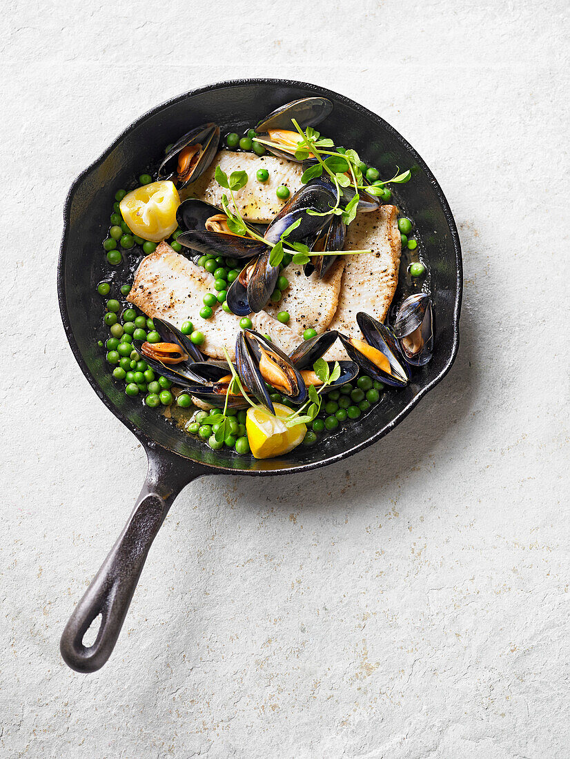 Sole with mussels, peas, and brown butter