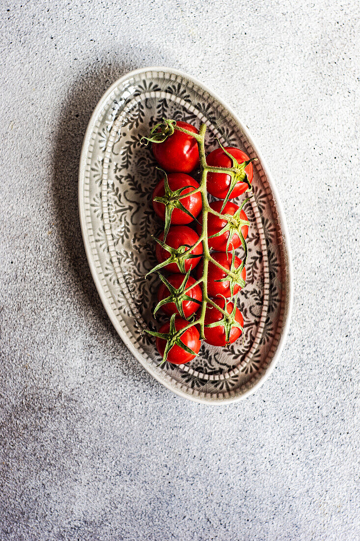 Raw and ripe cherry tomatoes