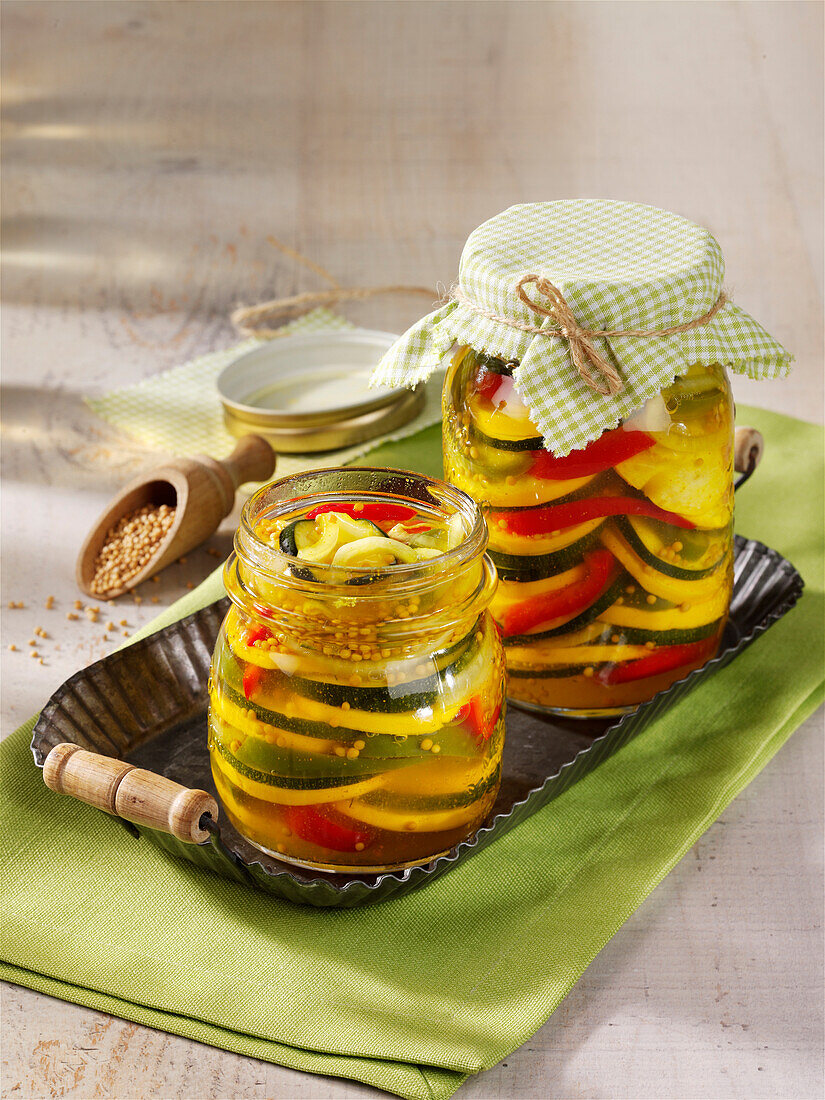 Sweet and sour pickled zucchini and peppers